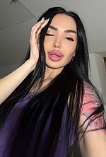 Ukrainian mail order bride Olena from Berlin with black hair and hazel eye color - image 8