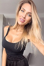 Ukrainian mail order bride Anastasiia from Kyiv with blonde hair and grey eye color - image 6