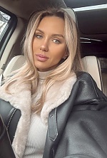 Ukrainian mail order bride Anastasiia from Kyiv with blonde hair and grey eye color - image 13