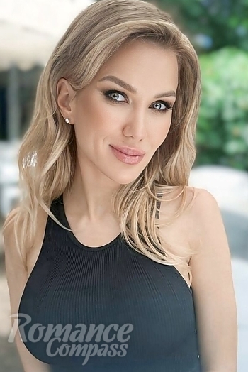 Ukrainian mail order bride Anastasiia from Kyiv with blonde hair and grey eye color - image 1