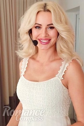 Ukrainian mail order bride Tatiana from Dnipro with blonde hair and blue eye color - image 1