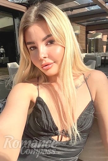 Ukrainian mail order bride Victoriia from Kyiv with light brown hair and brown eye color - image 1