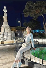 Ukrainian mail order bride Olga from Kyiv with blonde hair and blue eye color - image 9