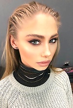 Ukrainian mail order bride Olga from Kyiv with blonde hair and blue eye color - image 15