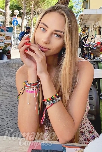 Ukrainian mail order bride Olga from Kyiv with blonde hair and blue eye color - image 1