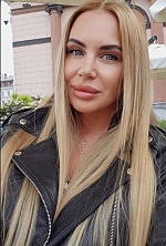 Ukrainian mail order bride Yuliia from Odesa with blonde hair and brown eye color - image 5