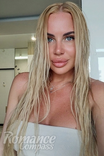 Ukrainian mail order bride Yuliia from Odesa with blonde hair and brown eye color - image 1