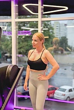 Ukrainian mail order bride Yuliia from Odesa with blonde hair and brown eye color - image 6