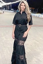 Ukrainian mail order bride Regina from Temirtau with light brown hair and green eye color - image 9