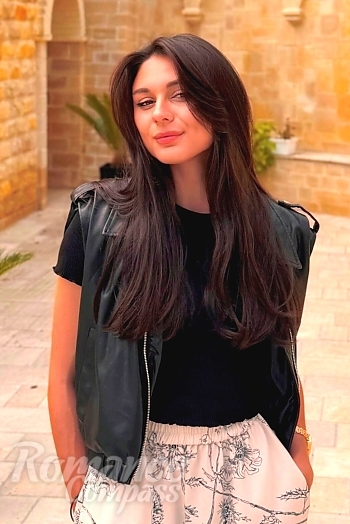 Ukrainian mail order bride Angelina from Ivano-Frankivsk with black hair and brown eye color - image 1