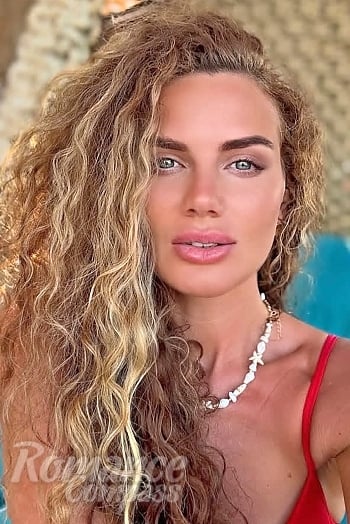 Ukrainian mail order bride Nataliia from Kyiv with light brown hair and blue eye color - image 1