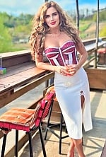 Ukrainian mail order bride Nataliia from Kyiv with light brown hair and blue eye color - image 7