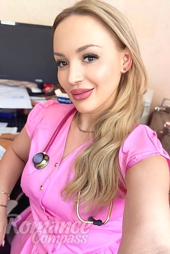 Ukrainian mail order bride Maria from Rivne with blonde hair and green eye color - image 1