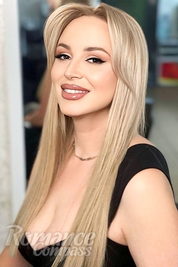 Ukrainian mail order bride Maria from Rivne with blonde hair and green eye color - image 1