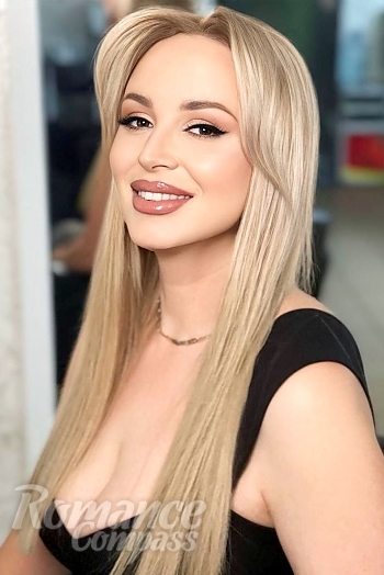 Ukrainian mail order bride Maria from Rivne with blonde hair and green eye color - image 1