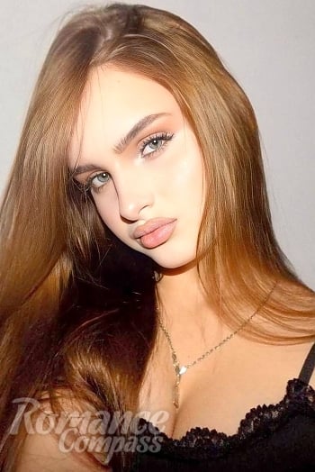 Ukrainian mail order bride Tatiana from Lviv with light brown hair and hazel eye color - image 1