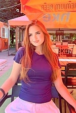 Ukrainian mail order bride Tatiana from Lviv with light brown hair and hazel eye color - image 5
