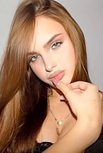 Ukrainian mail order bride Tatiana from Lviv with light brown hair and hazel eye color - image 4