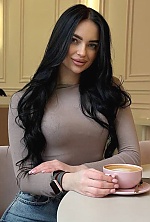 Ukrainian mail order bride Olena from Kharkiv with black hair and green eye color - image 13