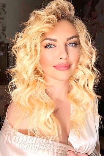 Ukrainian mail order bride Iryna from Odesa with blonde hair and green eye color - image 1