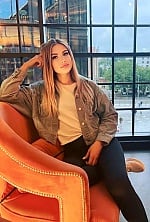 Ukrainian mail order bride Olena from Warsaw with blonde hair and green eye color - image 7