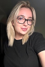 Ukrainian mail order bride Elizaveta from Kyiv with light brown hair and green eye color - image 9