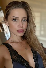 Ukrainian mail order bride Yuliia from Poltava with light brown hair and green eye color - image 10