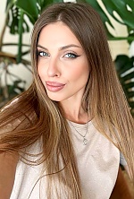 Ukrainian mail order bride Yuliia from Poltava with light brown hair and green eye color - image 6