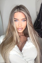 Ukrainian mail order bride Sarah from Warsaw with light brown hair and blue eye color - image 6