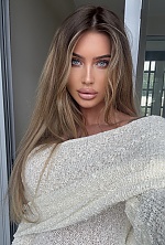 Ukrainian mail order bride Sarah from Warsaw with light brown hair and blue eye color - image 5