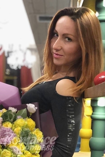 Ukrainian mail order bride Yevheniia from Lloret de Mar with red hair and green eye color - image 1