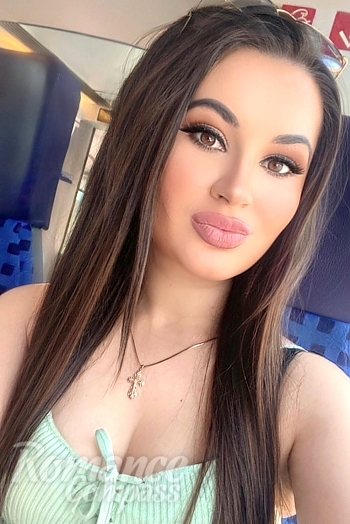 Ukrainian mail order bride Olena from Leipzig with black hair and hazel eye color - image 1