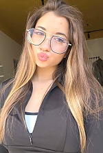 Ukrainian mail order bride Kateryna from Odesa with light brown hair and brown eye color - image 11