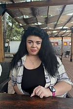 Ukrainian mail order bride Marta from Kyiv with black hair and brown eye color - image 5