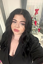 Ukrainian mail order bride Marta from Kyiv with black hair and brown eye color - image 4