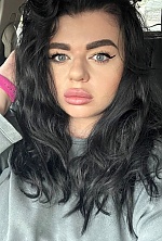 Ukrainian mail order bride Marta from Kyiv with black hair and brown eye color - image 7