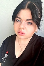 Ukrainian mail order bride Marta from Kyiv with black hair and brown eye color - image 10