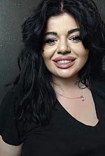 Ukrainian mail order bride Marta from Kyiv with black hair and brown eye color - image 11