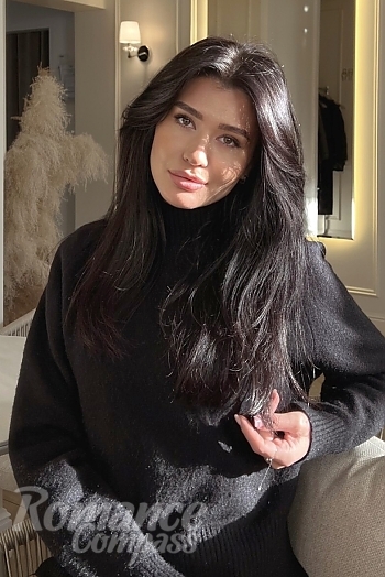 Ukrainian mail order bride Oksana from Kyiv with light brown hair and brown eye color - image 1