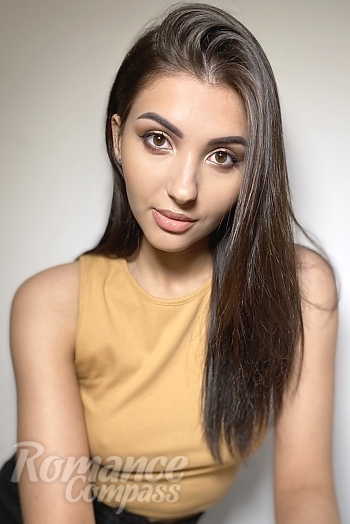 Ukrainian mail order bride Anastasiia from Kyiv with light brown hair and brown eye color - image 1