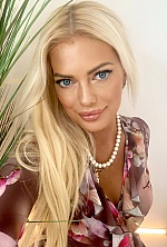 Ukrainian mail order bride Tetyana from Kyiv with blonde hair and blue eye color - image 12