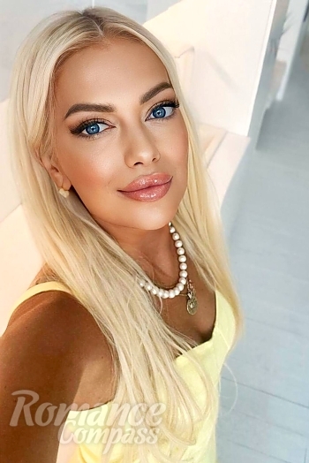 Ukrainian mail order bride Tetyana from Kyiv with blonde hair and blue eye color - image 1