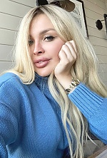 Ukrainian mail order bride Sumska from Kyiv with blonde hair and green eye color - image 16