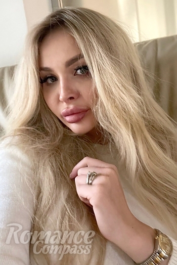 Ukrainian mail order bride Sumska from Kyiv with blonde hair and green eye color - image 1
