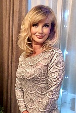 Ukrainian mail order bride Larisa from Warsaw with blonde hair and green eye color - image 3