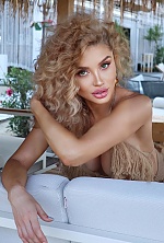 Ukrainian mail order bride Raisa from Bucharest with blonde hair and green eye color - image 8