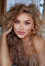 Ukrainian mail order bride Raisa from Bucharest with blonde hair and green eye color - image 4