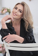 Ukrainian mail order bride Valentina from Kyiv with blonde hair and blue eye color - image 10