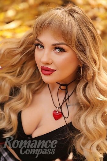 Ukrainian mail order bride Yuliya from Kiyiv with blonde hair and grey eye color - image 1