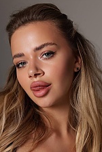 Ukrainian mail order bride Sofiia from Kyiv with blonde hair and blue eye color - image 4